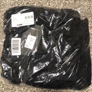 Black knot dress still in the bag with tags